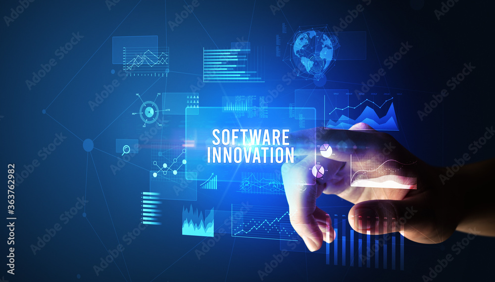 Hand touching SOFTWARE INNOVATION inscription, new business technology concept Hand touching SOFTWARE INNOVATION inscription, new business technology concept