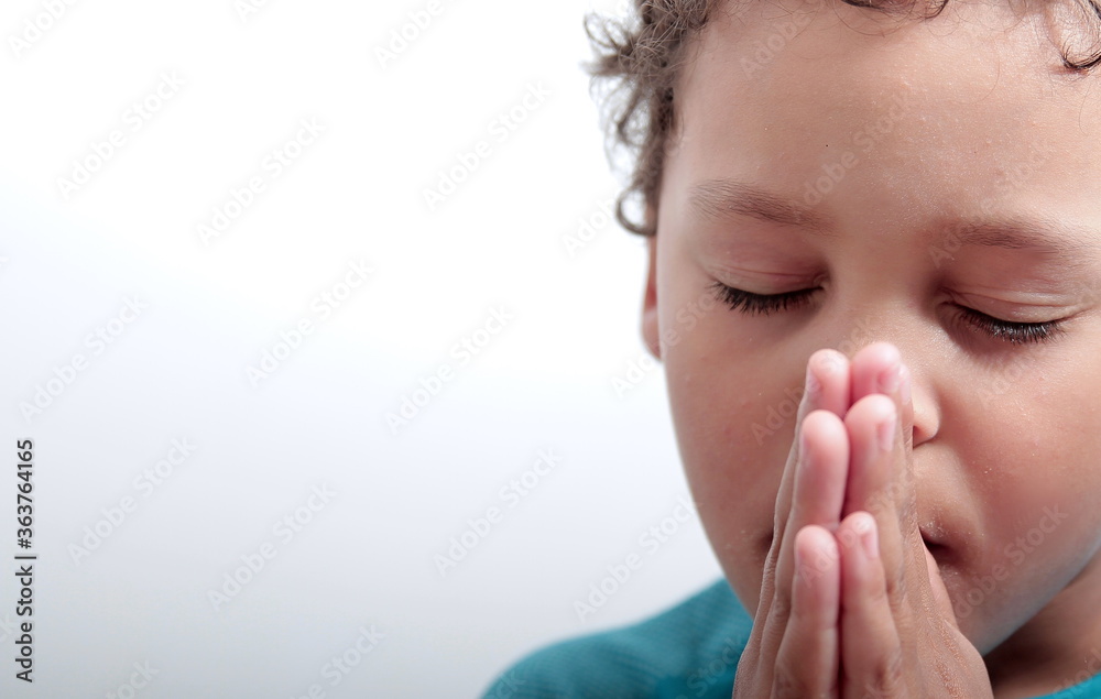 boy praying with hands together stock photo boy praying with hands together stock photo