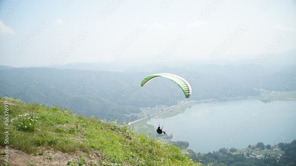 Fly over the lake Kizaki with a paraglider Fly over the lake Kizaki with a paraglider
