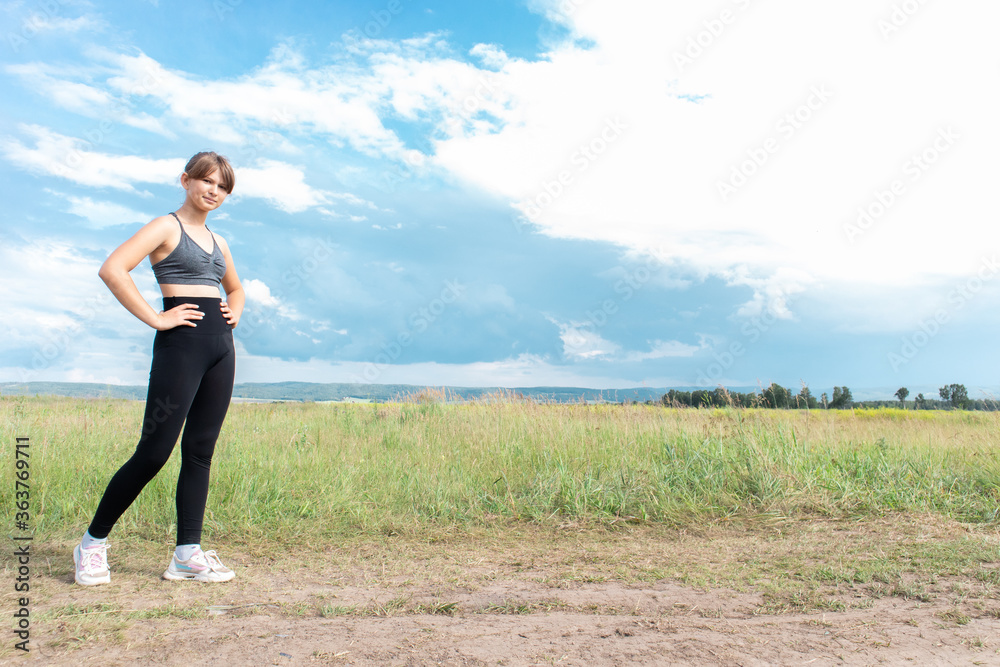 Young woman running in the nature. Free space for text Young woman running in the nature. Free space for text