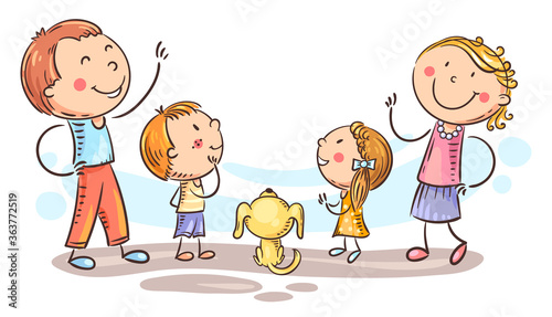 Family with two kids and a puppy looking up, copy space for your design