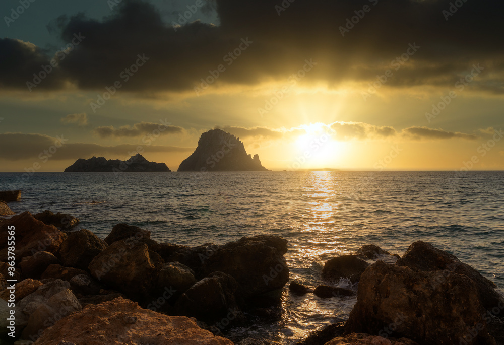 Sunset in Ibiza next to the island of Es vedra