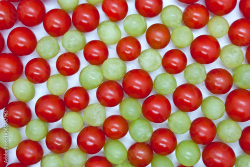tomatoes and grapes, mixed, top view