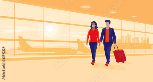 Young man and woman traveler wearing face masks with luggage walking at airport gate terminal lounge traveling during pandemic outbreak. Airplanes behind the glass window. New normal holiday vacation.