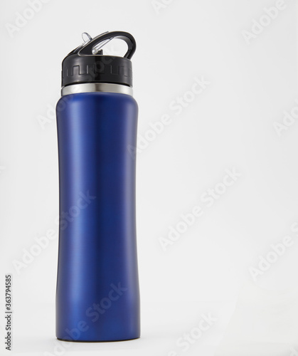Full length blue aluminium waterbottle. Isolated on white background.