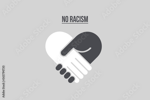 No racism. Two hands handshake with diferent colors meaning we are all the same and we need to stop racism. Black and white shaking hands 