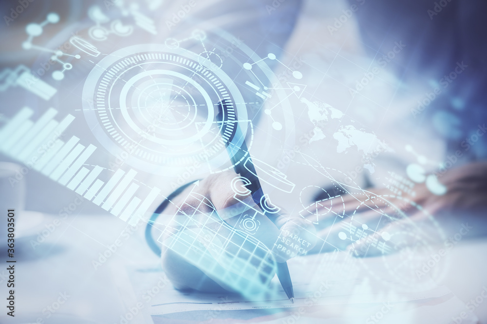 Double exposure of Man writing in notepad with business icons on background. Double exposure of Man writing in notepad with business icons on background.