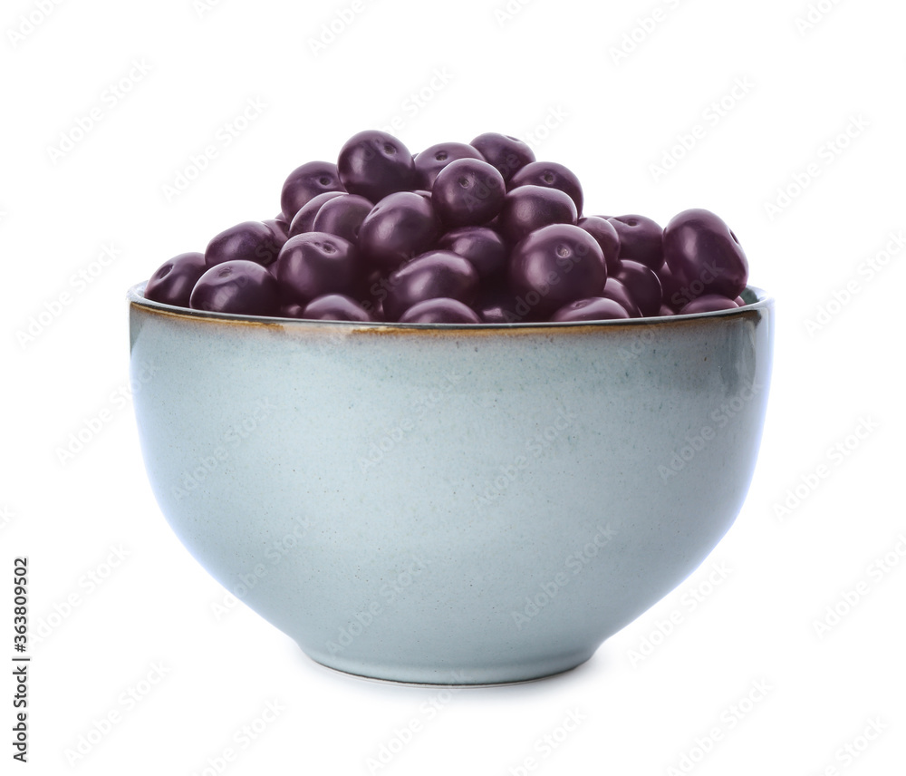 Fresh acai berries in bowl isolated on white Fresh acai berries in bowl isolated on white