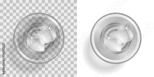A glass with a drink and ice on a transparent background. Top view.