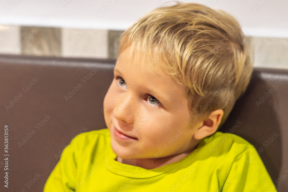 Close up portrait cute boy change his mood from smiling till serious, surprised, intriguing, cunning, funny, mischievous, sad, daydreaming. Happy childhood,home education, family relationship concept Close up portrait cute boy change his mood from smiling till serious, surprised, intriguing, cunning, funny, mischievous, sad, daydreaming. Happy childhood,home education, family relationship concept