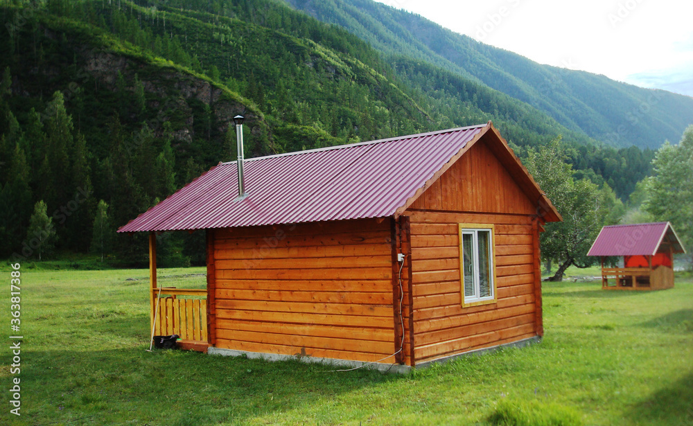 Fototapeta premium Wooden house in the mountains