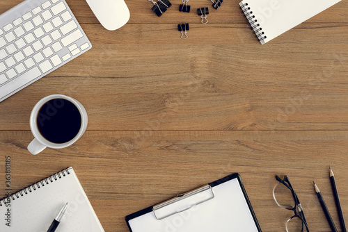 Flat lay, top view wooden office desk Workspace