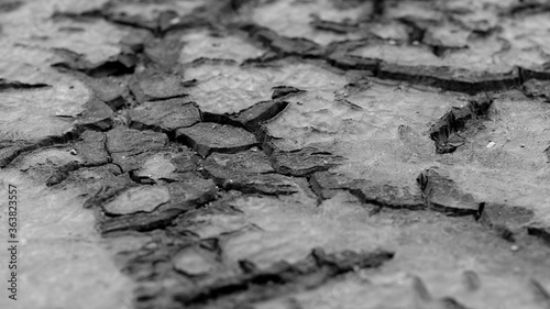 Dried cracked black mastic