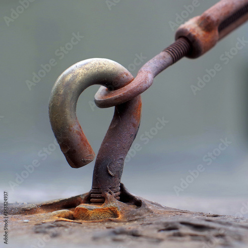 Rusty steel hook with tie