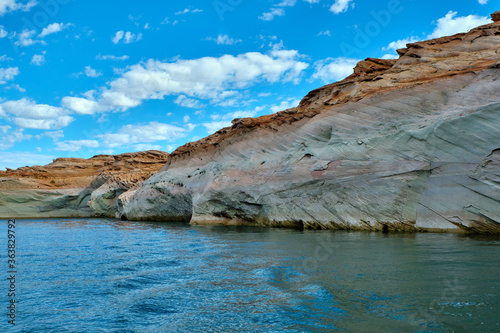 View of narrow  cliff-lined canyon from a boat in Glen Canyon National Recreation Area  Lake Powell  Arizona