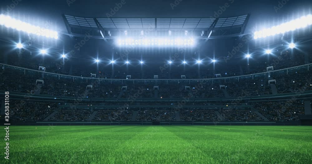 Sports Video background with a stadium full of fans, grass pitch and with spotlights on. Sport building 4k loop animation.