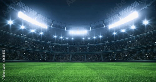 Sports Video background with a stadium full of spectators, grass pitch and with spotlights on. Sport building 4k loop animation. photo