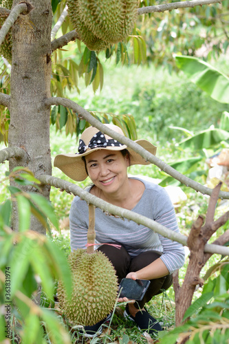 Happiness Women in the durian garden 