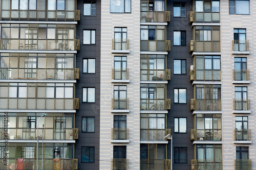 gray building facade with balconies