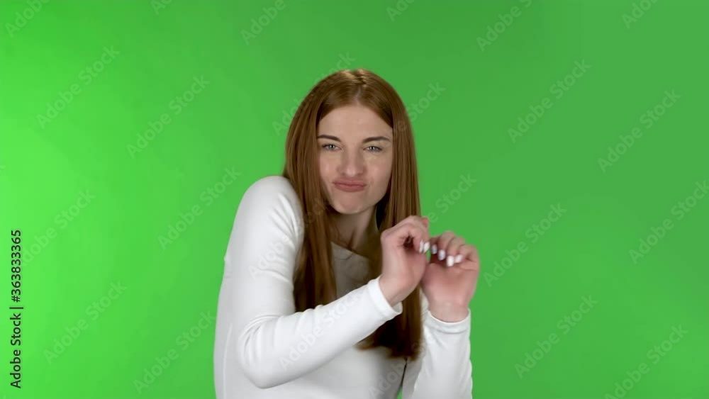 Portrait of pretty young woman is dancing funny. Portrait of pretty young woman is dancing funny.