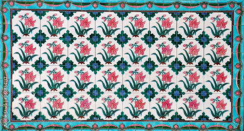 Pink and turquoise peranakan tile mosaic. photo