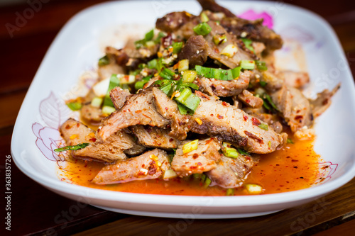 Thai food name is Grilled pork with spicy salad, Thai food