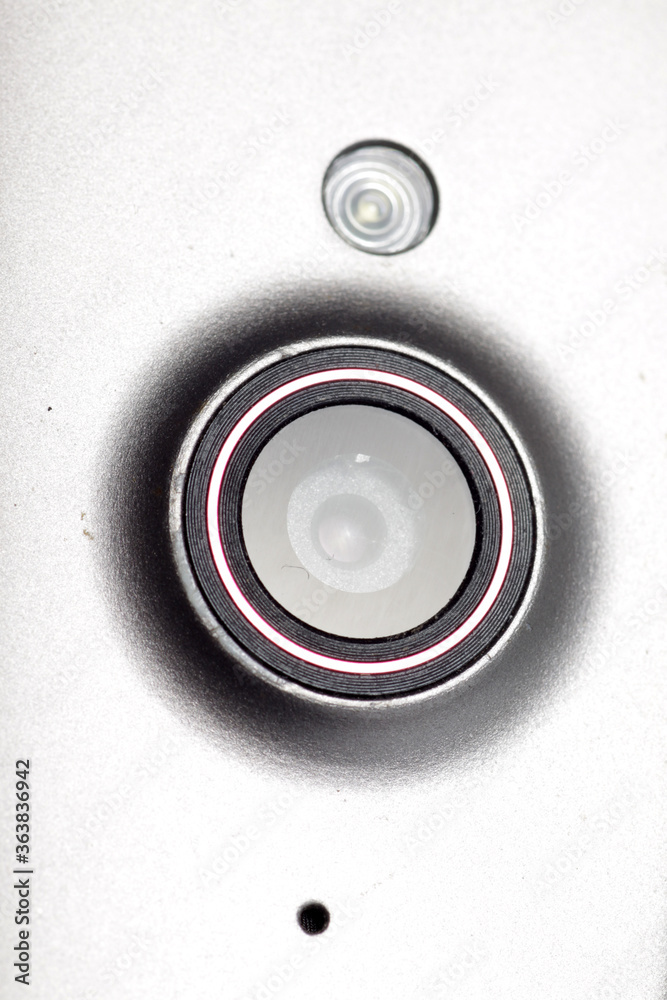Macro shot of a smartphone camera on a white isolated background Macro shot of a smartphone camera on a white isolated background
