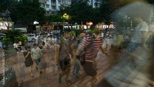 Fototapeta Naklejka Na Ścianę i Meble -  China. Guangzhou - April 05, 2019: City people rushing on the street