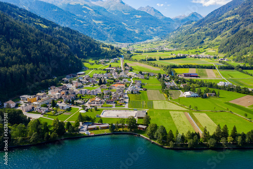 Poschiavo valley, Switzerland, aerial view of the village of Le Prese from the Poschiavo lake