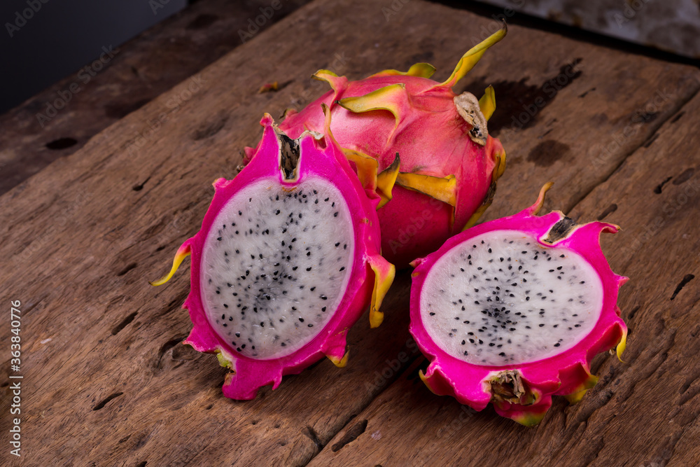 Dragon Fruit On old Wooden Table Dragon Fruit On old Wooden Table