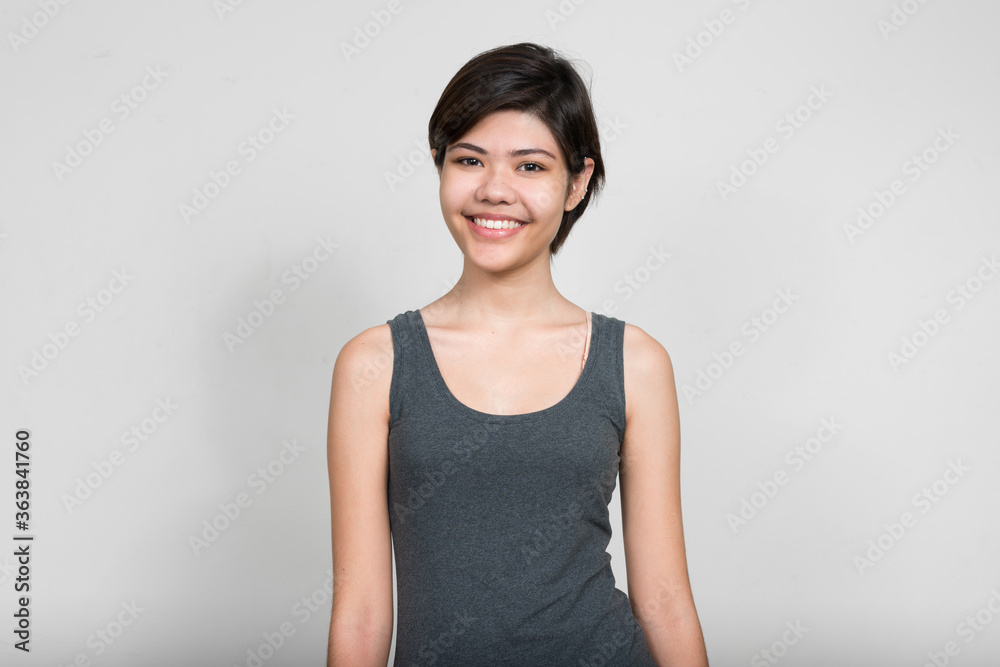 Portrait of happy young beautiful teenage girl smiling Portrait of happy young beautiful teenage girl smiling