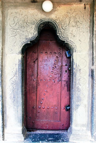 The entrance of the traditional stone-made church of Saint George at Negades village, one of the 45 villages known as Zagoria or Zagorochoria in Epirus region of southwestern Greece, August 9 2010. photo