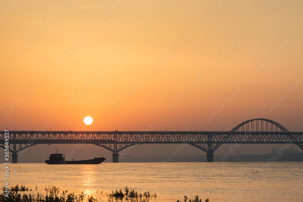 jiujiang highway and railway combined bridge in sunrise