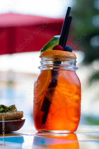 Spritz cocktail and appetizer on the table. Italian aperitivo and cocktail drinks