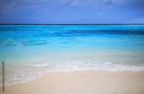 Tropical Maldives beach with white sand and blue sky. © Swetlana Wall