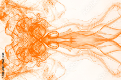 Orange smoke on white background, orange ink background, movement of orange smoke