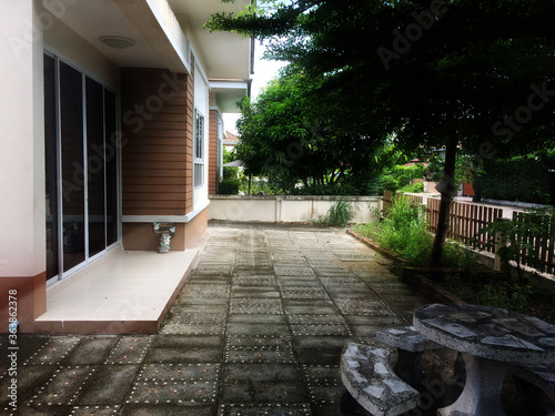 entrance of a house at the morinng with Bench