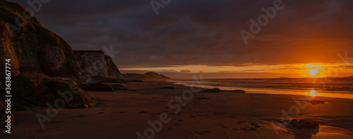 Sunset on the beach at White Rocks, Causeway Coast, Northern Ireland