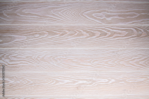 the structure of white parquet on the floor in the bedroom