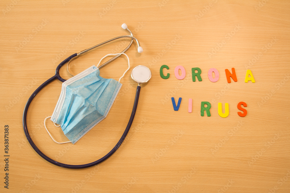 medical stethoscope on the table with colored letters that write coronavirus covid 19 medical stethoscope on the table with colored letters that write coronavirus covid 19