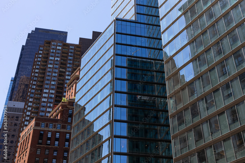 Naklejka premium Old and New Buildings and Skyscrapers in Midtown Manhattan of New York City