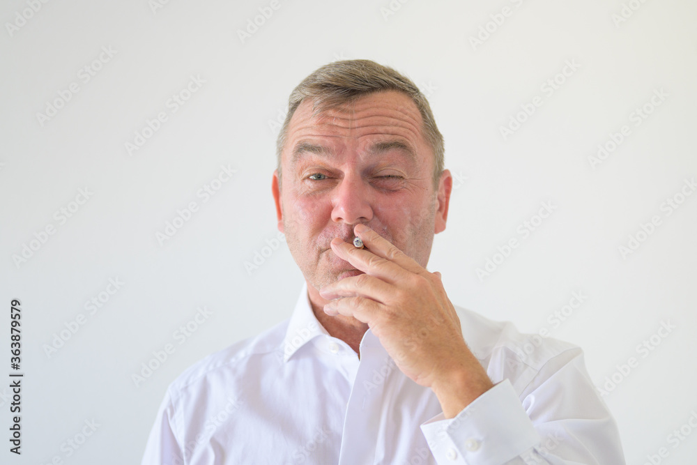 Middle-aged man smoking a cigarette