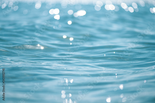 Fototapeta Naklejka Na Ścianę i Meble -  Close up of sea wave, low angle view. Selective focus, bokeh