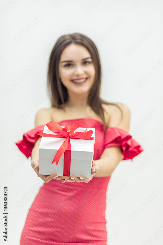 Time for gifts. Completely delighted girl shows her birthday present and enjoys the holiday moment. Time for gifts. Completely delighted girl shows her birthday present and enjoys the holiday moment.