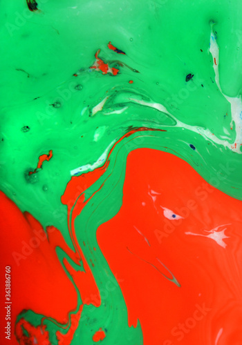 Splash of paint.Closeup abstract color mixing of water  acrylic oil and milk for use as background image. Acrylic texture with marble pattern  multi color background 