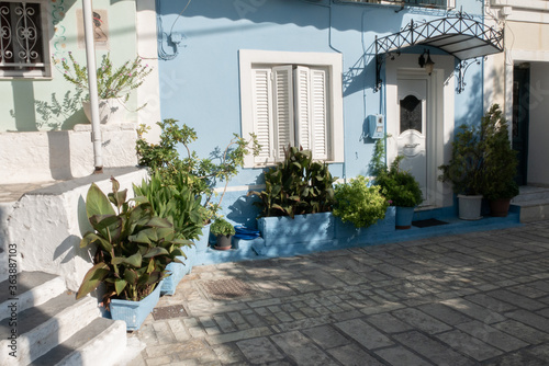 Small street with sea background and green plant. Dreamy with little balconys photo