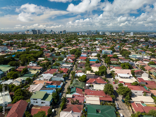 Aerial of BF Paranaque, and Alabang skyline in background. It is the largest subdivision in Asia. A neighborhood of middle class Filipinos. photo