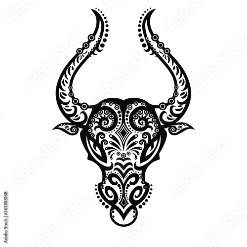 The bull in the ethnic style. Indian motifs. Vector graphics for Tattoos. Happy new year to 2021. Taurus as a symbol of the zodiac. The outline of the bull.