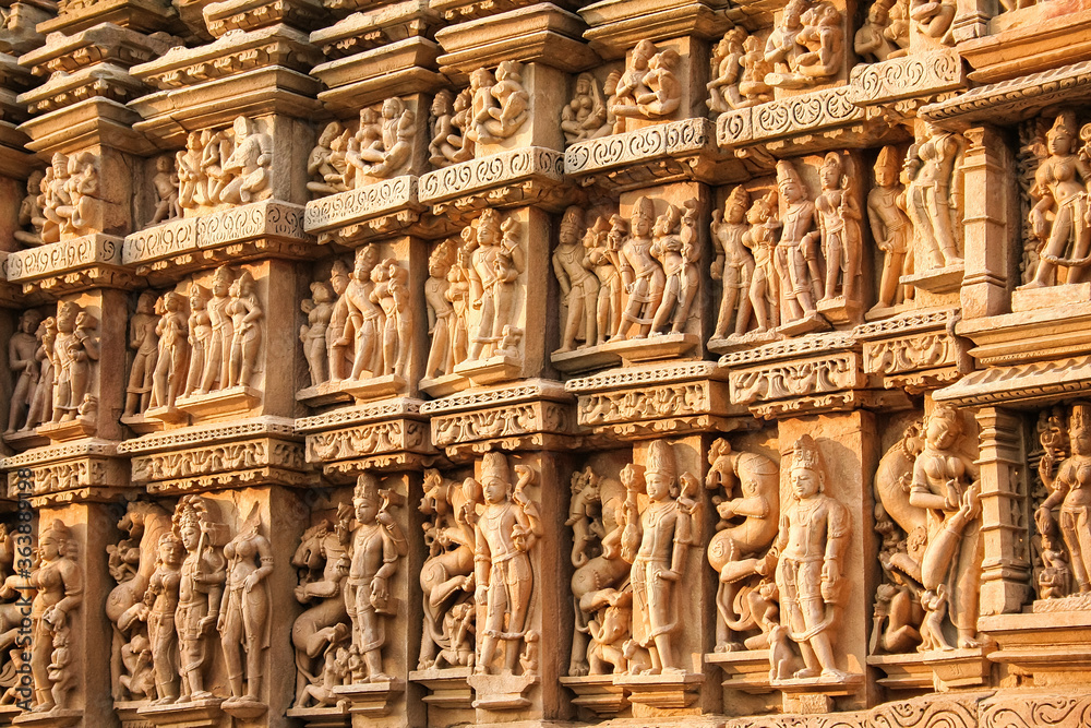 Close up of artful carved walls, Ancient reliefs at famous erotic temple in Khajuraho, Madhya Pradesh, India.