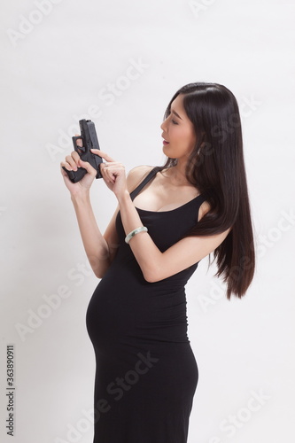 seven months pregnant on white background.